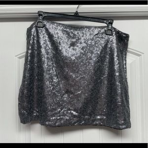Sequin silver mini skirt.
